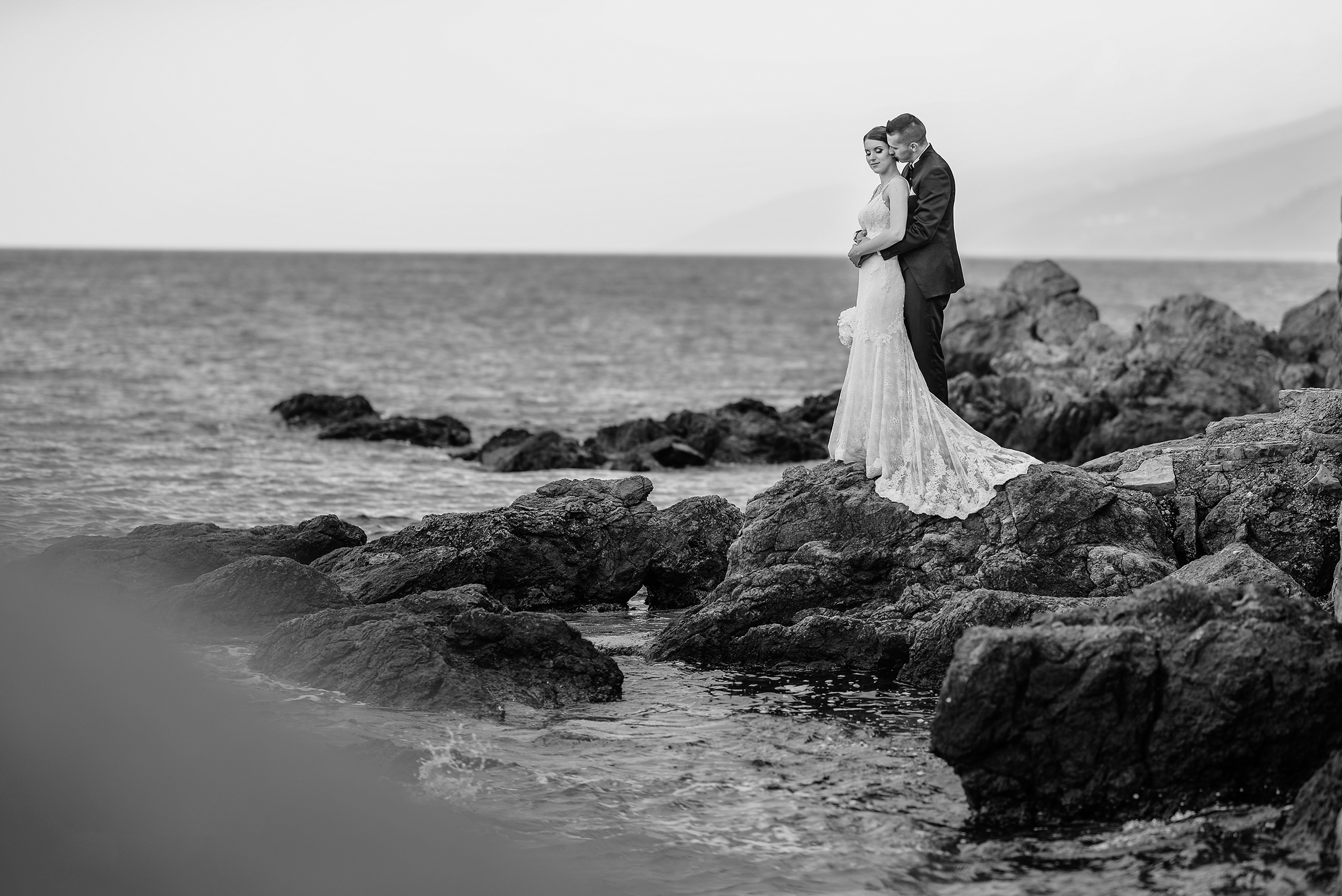 bride Mariet and groom Fran hugging together on the rock in Tbilisi Georgia